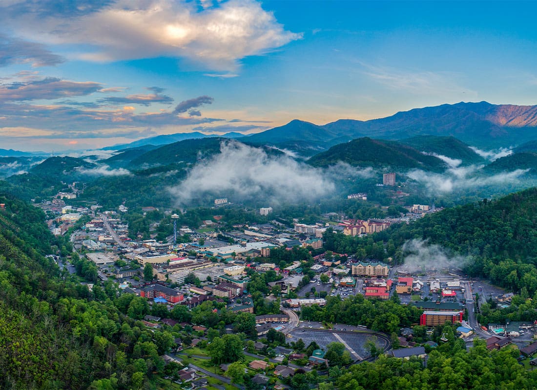 Athens, TN - Beautiful Cloudy View Over a Local City in the Moutains